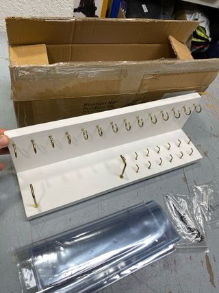 Porta medalhas e organizador de troféus