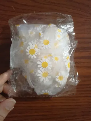 Copri-gabbia con margherite.