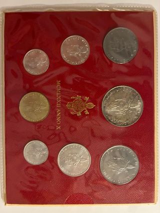 Lote 2 monedas y 5 estuches conmemorativos