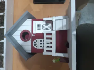 Casita de pájaros decorativa