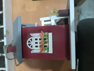 Casita de pájaros decorativa