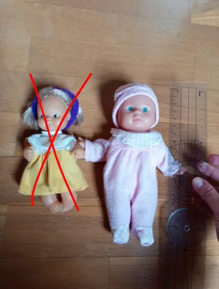 Muñeco bebé rosa con gorrito