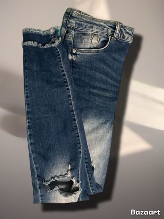 Jeans blu strappati