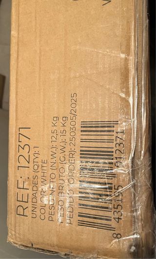 Cuna de madera blanca con ruedas