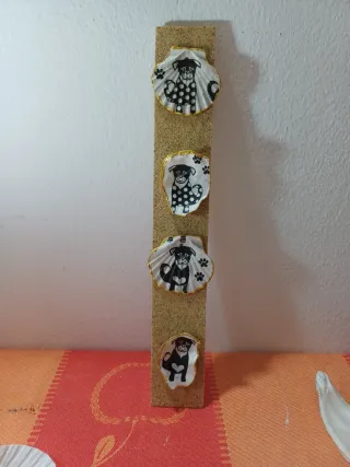 Conchas decoradas com cães em decoupage