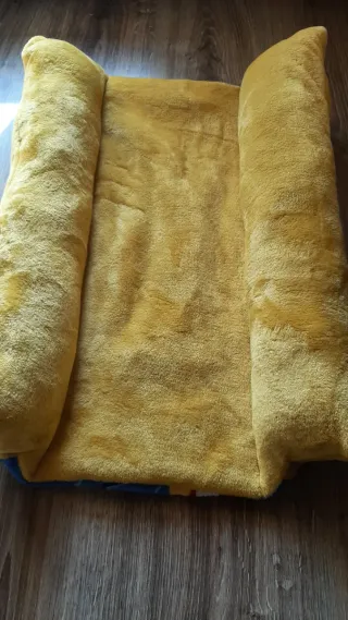 Letto per conigli con cuscini