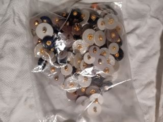 Stock Bottoni dorati e multicolore