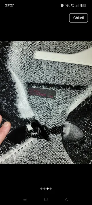 Giacca con cappuccio nera e bianca