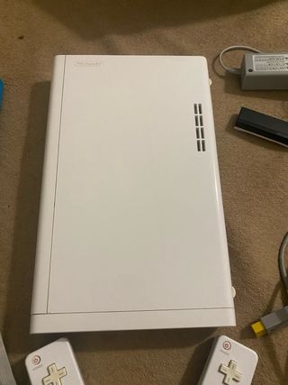 Nintendo Wii U + 2 Giochi + 2 Manette Wii