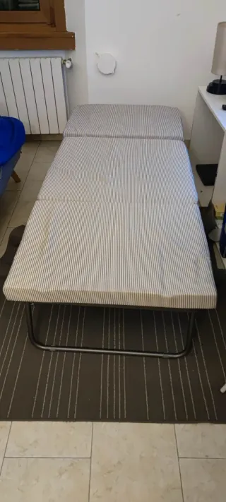 Poltrona letto blu in tessuto