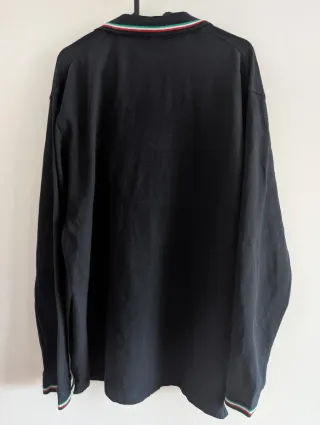 Polo manga larga azul marino con detalles