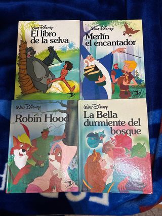 4 cuentos de Walt Disney en tapa dura.