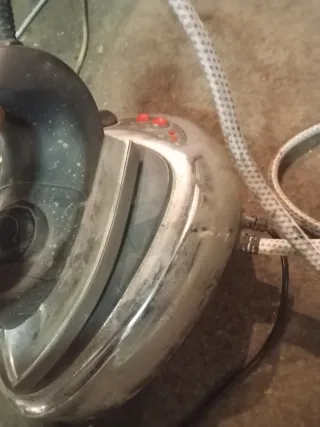 Centro de planchado antiguo.funciona perfectamente