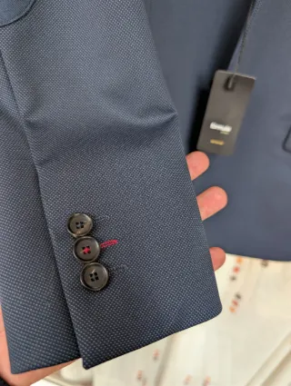 Americana azul marino Fórmula Joven. Talla L