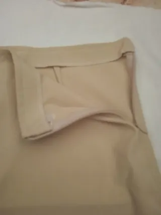 Pantaloni donna gamba ampia beige con zip laterale