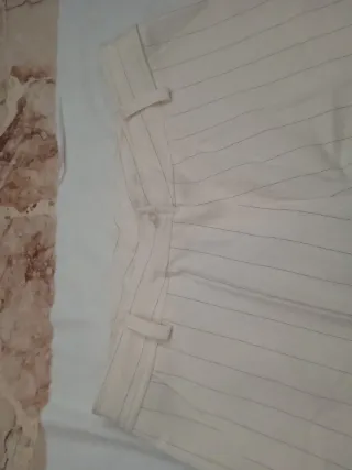 Pantaloni donna a gamba ampia panna rigati