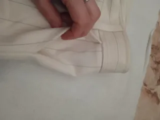 Pantaloni donna a gamba ampia panna rigati