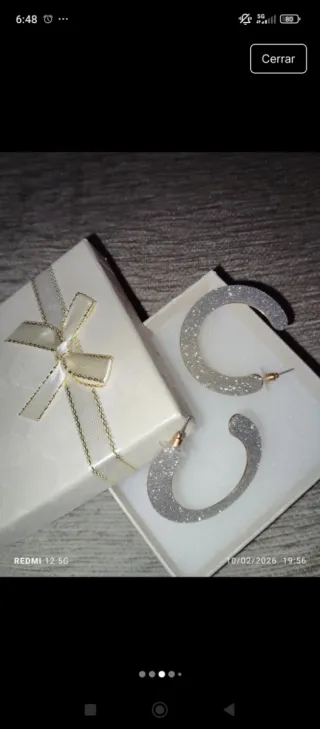 Pendientes de aro plateados y dorados