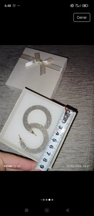 Pendientes de aro plateados y dorados