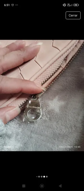 Bolso bandolera rosa efecto piel