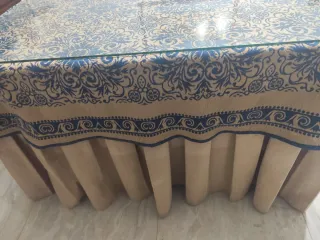 Ropa de camilla beige y azul