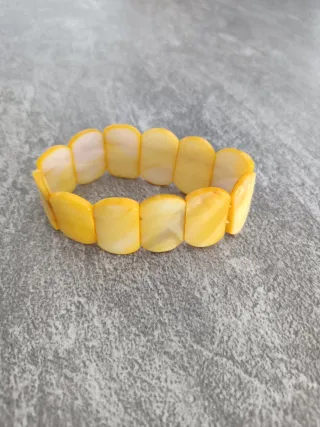 Dos pulseras óvalo azul y amarillo