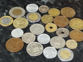 Lote 24 monedas variadas
