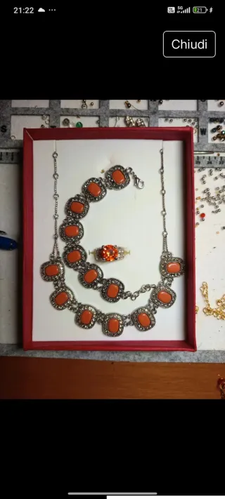 Parure collana e anello arancione