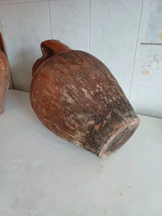 Antigua vasija de barro