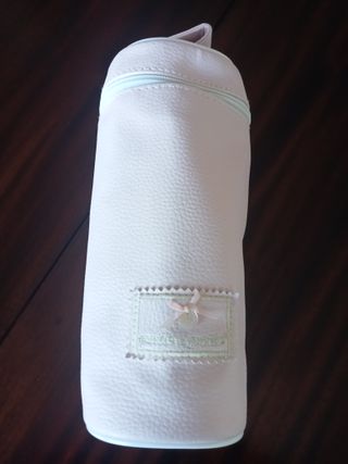 Conjunto cambiador y porta biberones rosa