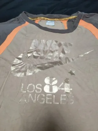 Camiseta Nike chica L marrón y naranja