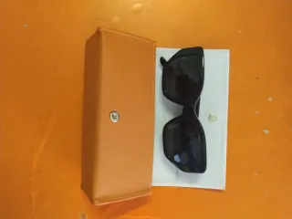 Occhiali da sole donna Luxottica neri e marroni