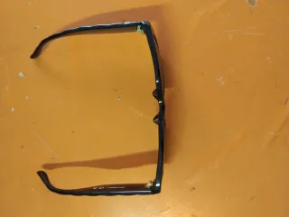 Occhiali da sole donna Luxottica neri e marroni