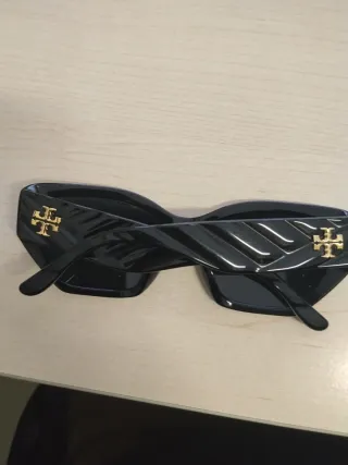 Occhiali da sole donna Luxottica neri e marroni