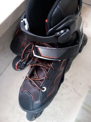 Pattini in linea neri e arancioni Oxelo