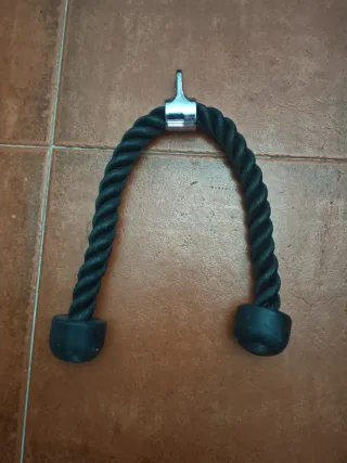 Equipo de gimnasio: mancuernas, barra y discos