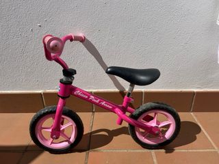 Bicicleta rosa Chicco para niña/o
