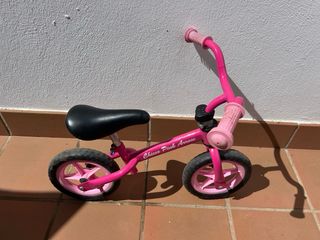 Bicicleta rosa Chicco para niña/o