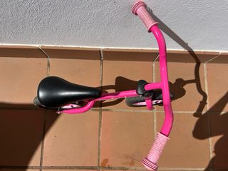 Bicicleta rosa Chicco para niña/o