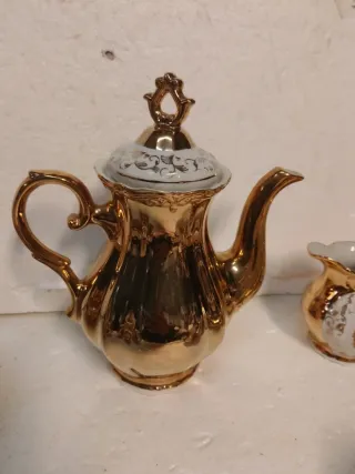 Servizio tazzine porcellana oro e bianco