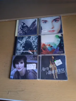 AMY WNEHOUSE,ALANIS MORISSE SINEAD O CONNOR,TRACY