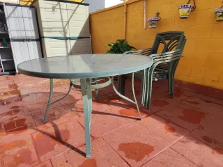 Mesa redonda cristal templado y 4 sillas jardín