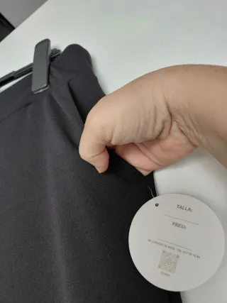 Pantalón malla acampanado negro