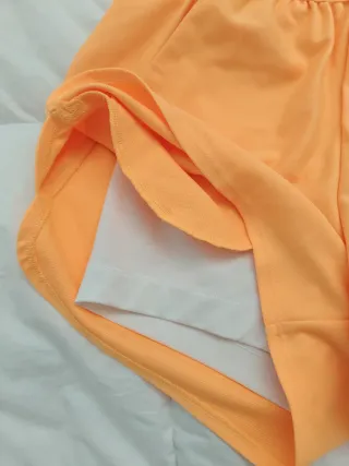 Pantaloncini sportivi Under Armour arancioni