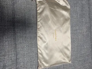 Bolso de mano Pandora dorado