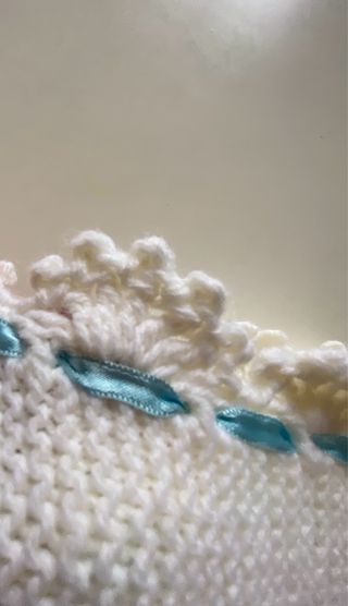 Copertina bianca in lana fatta a mano