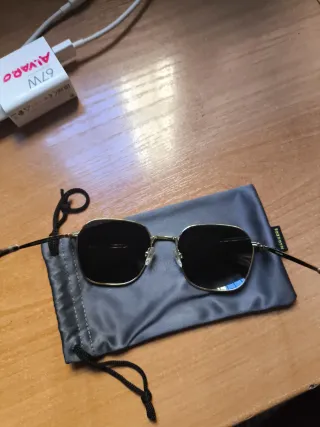 Gafas de sol Hawkers doradas y negras