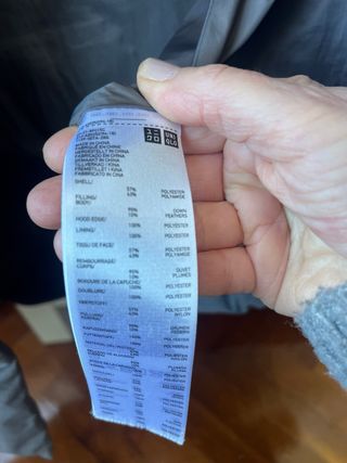 Abrigo plumífero gris sin costuras