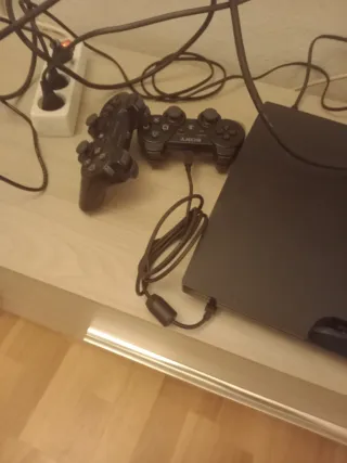 PS3 Slim Sony + Joystick Nero