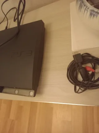 PS3 Slim Sony + Joystick Nero
